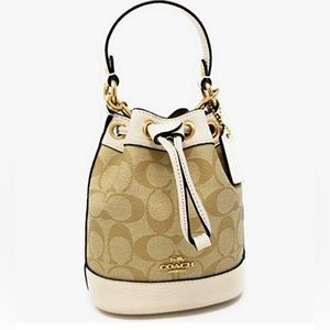 Dempsey Drawstring Bucket Bag 15 In Signature Canvas